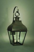 Northeast Lantern 7647-DB-LT2-CLR - Curved Top Wall With Top Scroll Dark Brass 2 Candelabra Sockets Clear Glass